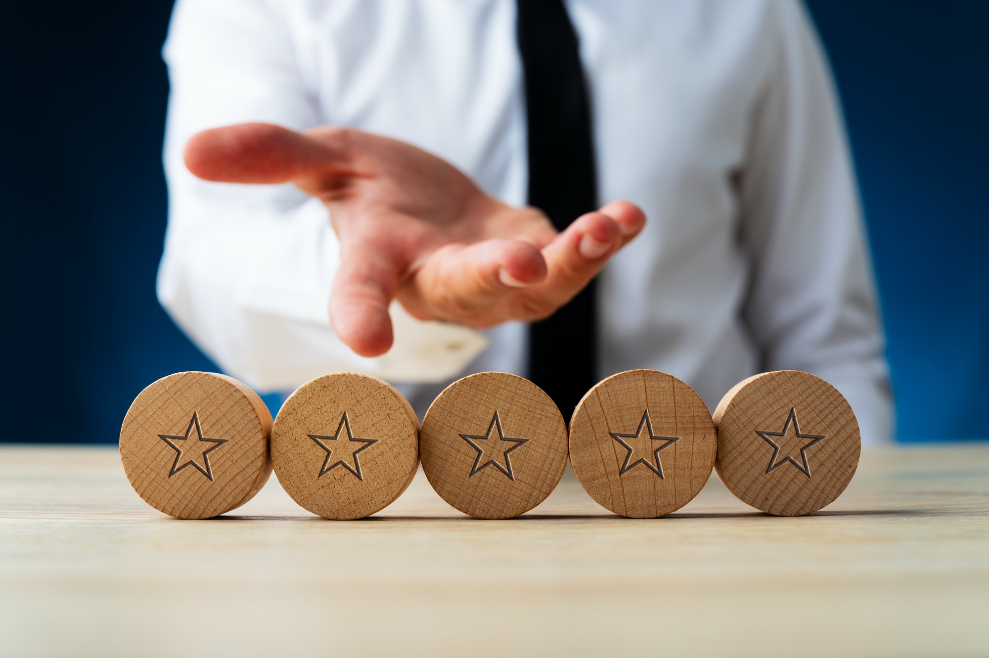 Five wooden cut circles with stars on them