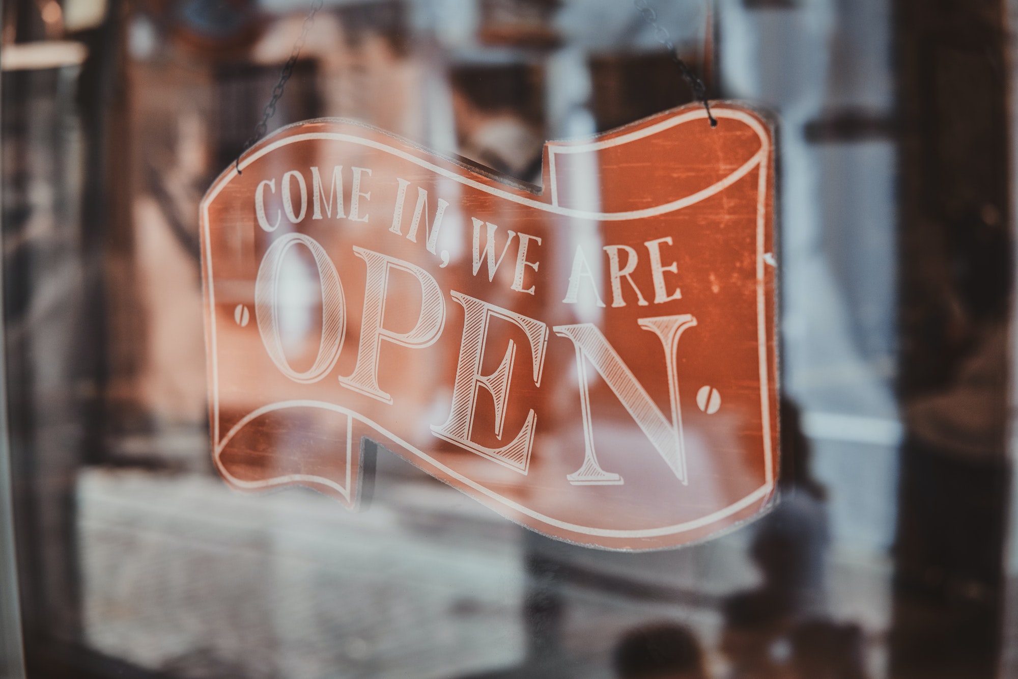 Nice nameplate with information about opening under the glass at barbershop